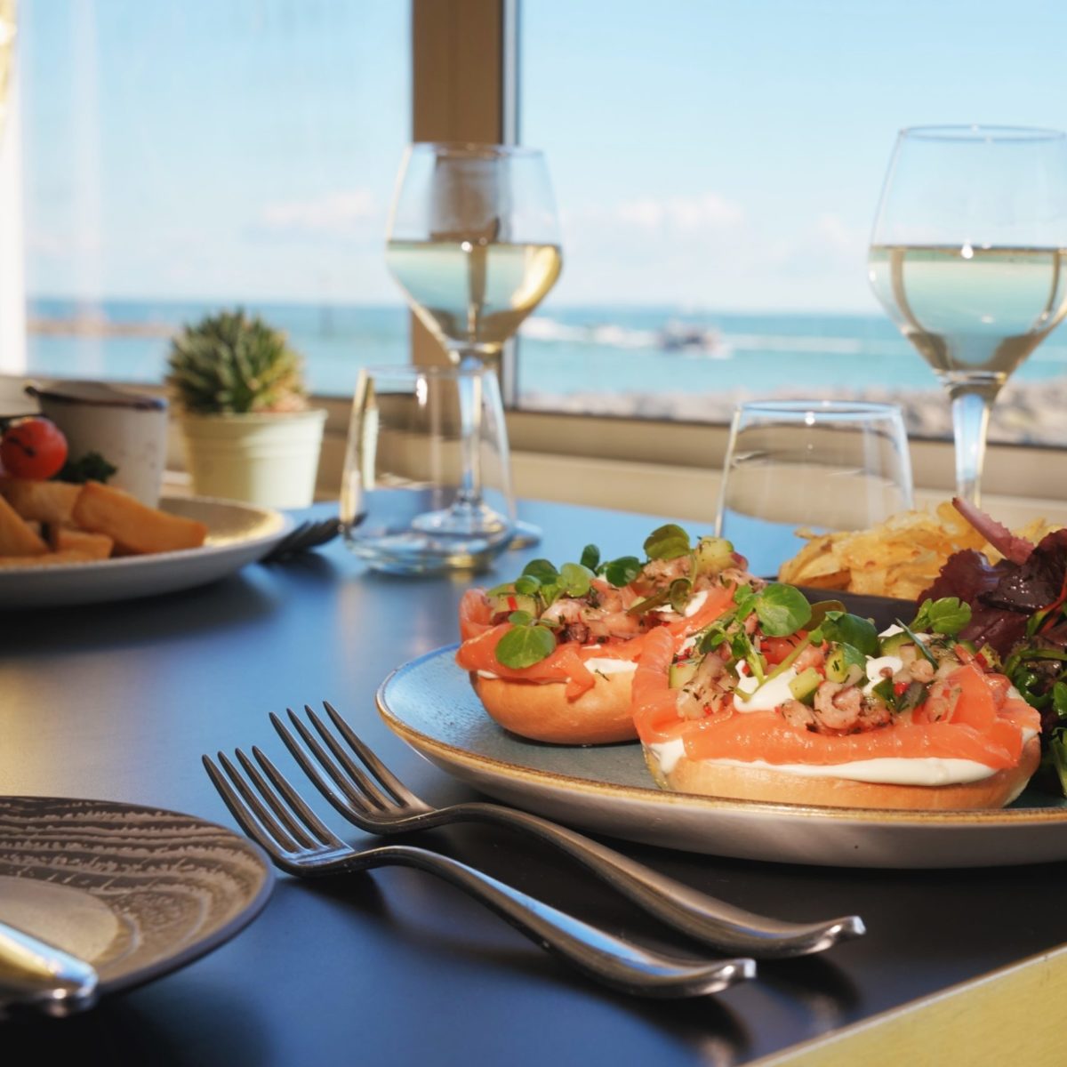 Haven Food salmon, ocean in background, indoors